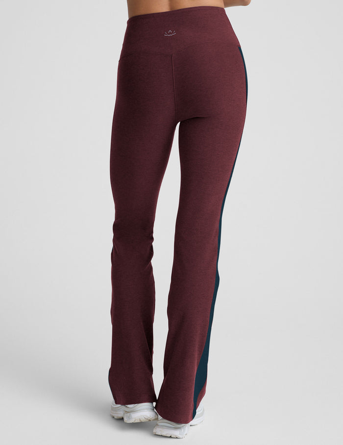 Rear view of maroon Spacedye Gemini Colorblock Side Slit Pant featuring white side stripes and a bootcut leg.
