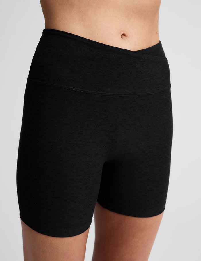 Woman wearing Black Spacedye At Your Leisure™ 5" Biker Short with an overlapping high-rise waistband, showing midriff.