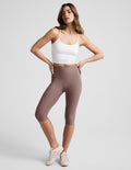 Brown Spacedye Pedal Pusher High Waisted Legging on a model, featuring a high rise and cropped length below the knee.